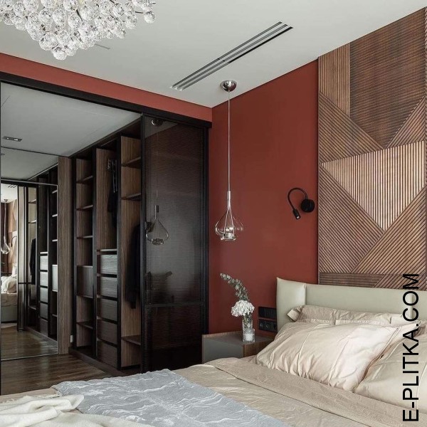 Спальня з гардеробною кімнатою у деревних тонах за склом