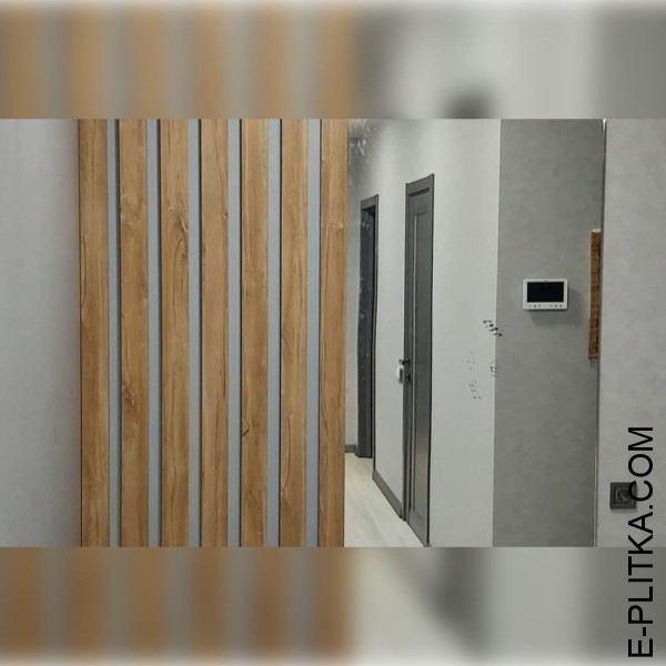 Вбудована шафа кутового планування у передпокій з вітальнею